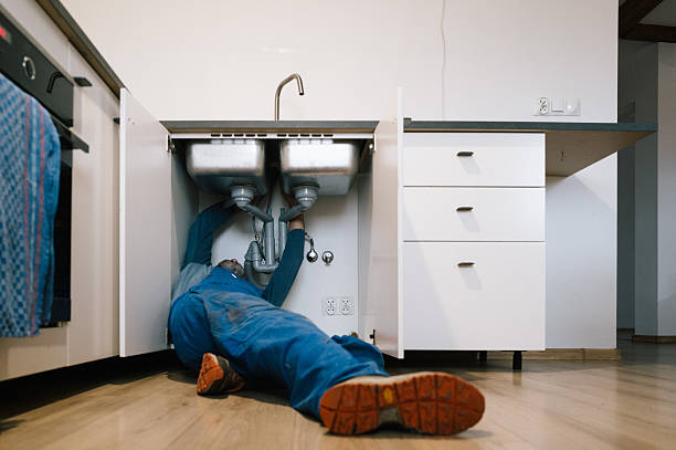 Professional Drain Cleaning technician working in Dowell, IL